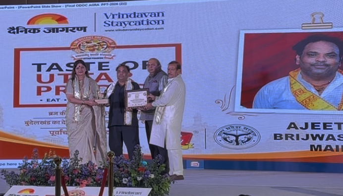 Brijwasi Sweets receiving the Best Soan Papdi award on stage at Taste of Uttar Pradesh 2026, organised by Dainik Jagran